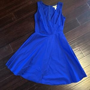 Gorgeous blue sleeveless dress with v-neck.
